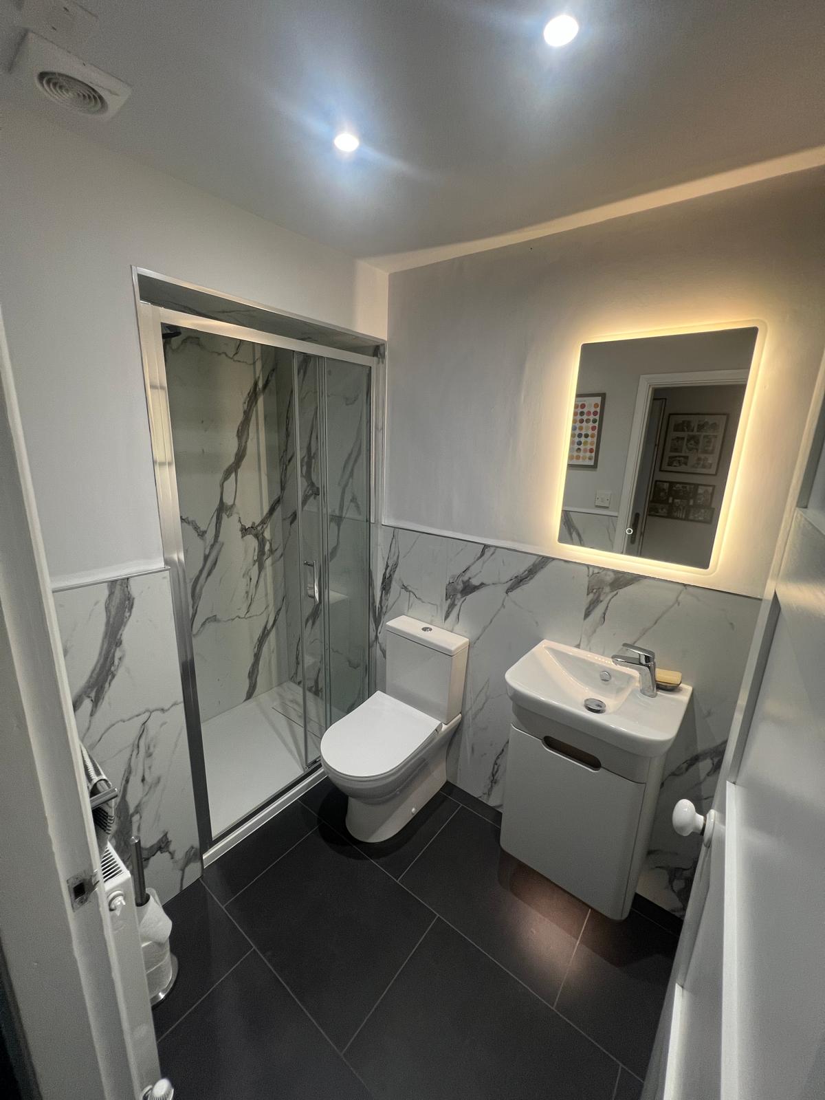 Space-saving downstairs shower